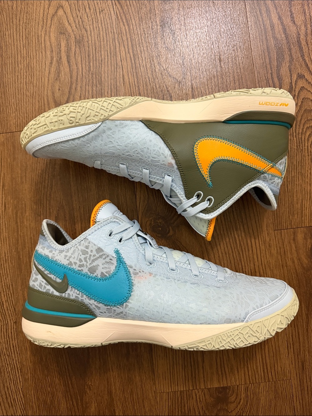 LBJ collab Nike Light Blue and Teal Basketball Shoes with Olive and Gold Accents